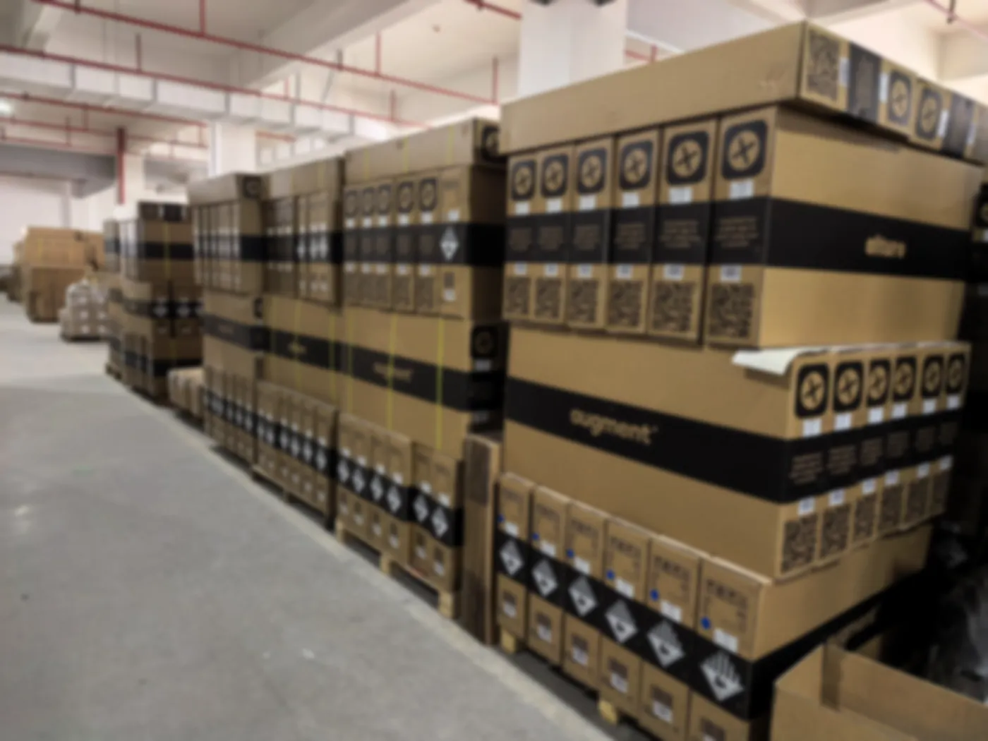 Palletized, export-packed D01 e-scooters in the Shenzhen warehouse